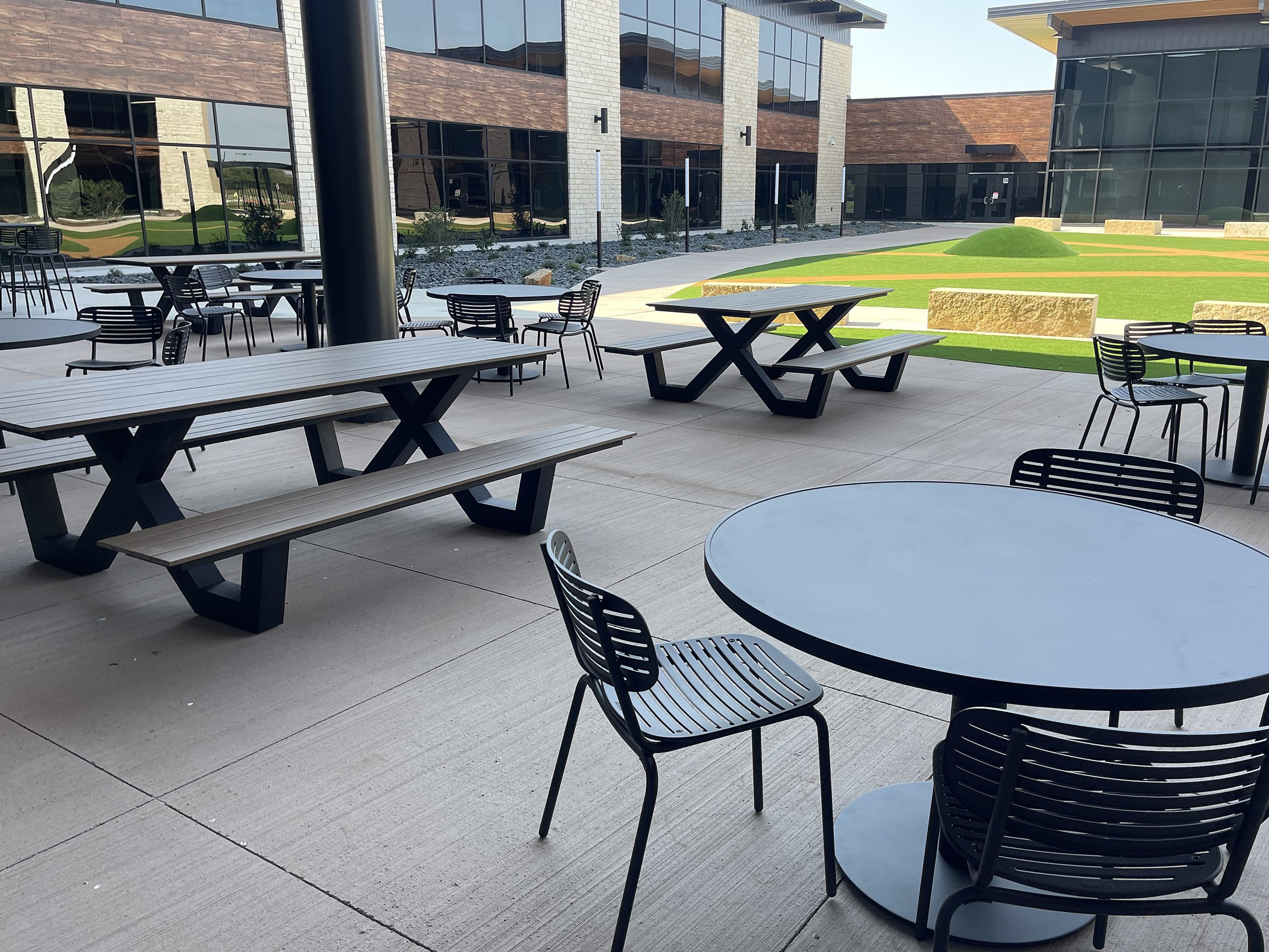 Outdoor classrooms and dining areas take a beating from the Texas climate.